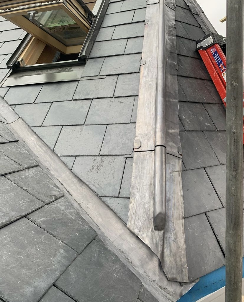 Lead welding and tray around chimney stack